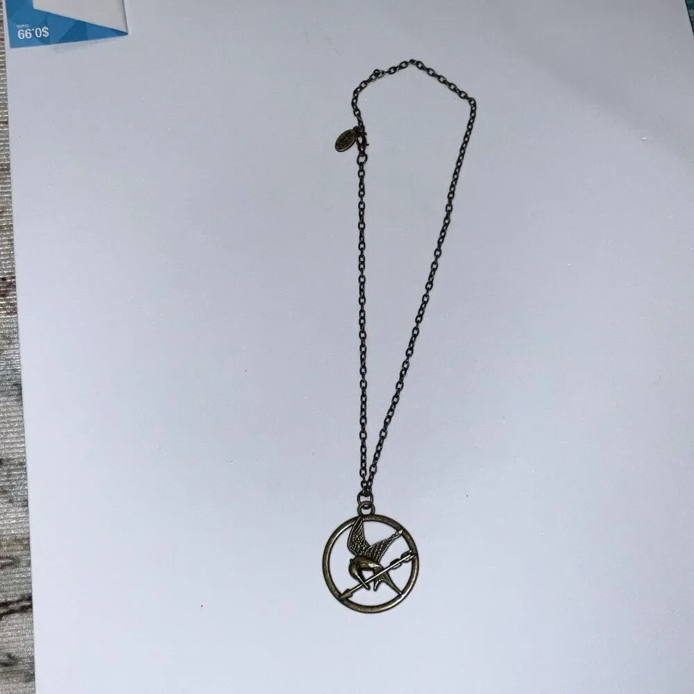 HUNGER GAMES Katniss Mockingjay Pendant Necklace Officially Licensed 2012 NEW